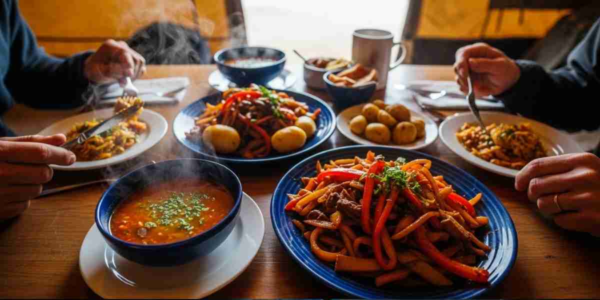 A delicious and colorful display of Inca Trail food, including quinoa soup and fresh vegetables, served inside a dining tent.