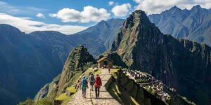 Hikers on the Inca Trail with a clear view of Machu Picchu on a sunny day, showcasing the best time to hike the Inca Trail.