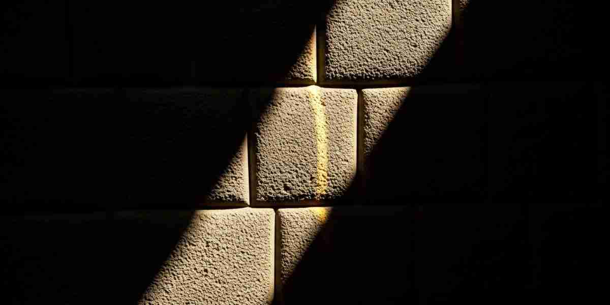 A dramatic sunbeam aligns perfectly with the corner of a precision-cut Inca wall in Cusco, symbolizing the ancient Inca philosophy of time and their connection to the cosmos.